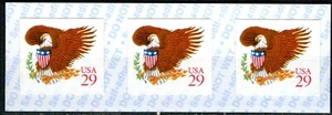 SC# 2597 - 1992-93 29¢ - Eagle & Shield (Red) Affixing Machine Strip of 3 - Picture 1 of 1