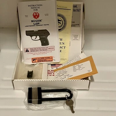 Factory Ruger LCP Cardboard Box And  Lock & Owner's Manual Paperwork - Image 1 of 4