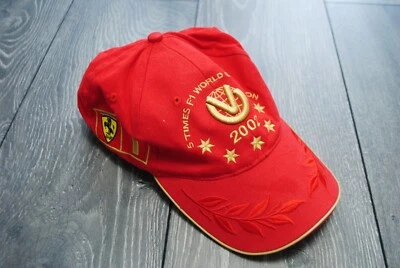 CAMPEÓN DEL MUNDO DE F1 2002 VINTAGE MICHAEL SCHUMACHER FERARRI GORRA ORO ROJO ORIGINAL Foto 1 de 4