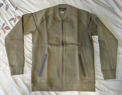 Chaqueta mediana verde oliva con cremallera con 2 bolsillos con cremallera. ¡Nuevo! Subasta benéfica Foto 1 de 4