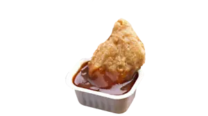 Nuevo pepita de pollo suspendida en salsa barbacoa utilería de comida sintética para exhibición - Imagen 1 de 1