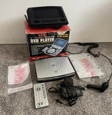 "Reproductor de DVD portátil Akai de 7"" con batería recargable cargador remoto de 12 V" Foto 1 de 4
