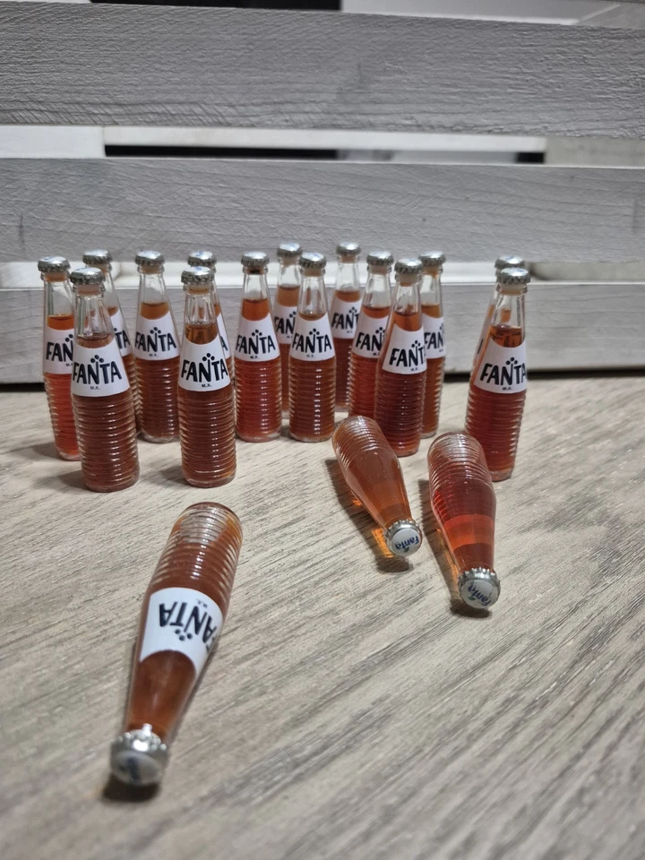 $15 each Mini Bottle Fanta 3' Vintage , metal screw cap,original liquid, glass - Image 1 of 4
