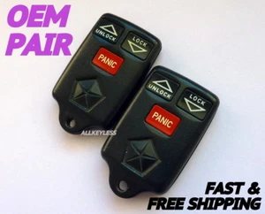 Original Pair of DODGE RAM TRUCK JEEP keyless entry remote fob transmitters OEM - Picture 1 of 1