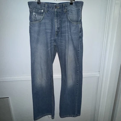 Pantalones de mezclilla Levis vintage plateados azules para hombre 32x32 True Boot 5 bolsillos 100 % algodón Foto 1 de 4