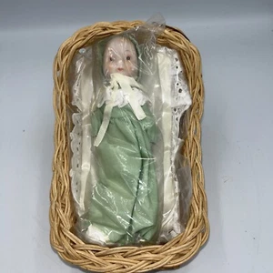 GEORGE GOOD PORCELAIN MUSIC BOX BABY DOLL IN GOWN WITH BASSINET & BEDDING W/TAG - Picture 1 of 6
