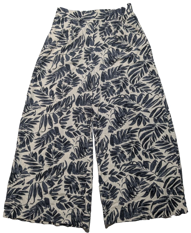 Pantalones recortados MNG MANGO para mujer pequeños azul marfil mezcla de lino AOP de pierna ancha Foto 1 de 4