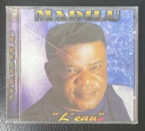 MADILU SYSTEM - RARE CD ALBUM JPS " L'EAU " NEUF SOUS BLISTER 1998 AFRO - Zdjęcie 1 z 4