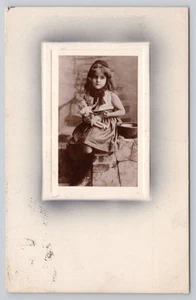 RPPC Young Girl Holding Doll Baby England 1909 Vintage Postcard - Picture 1 of 2