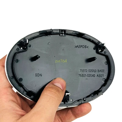 09-13 Toyota Corolla Emblem Front Grill Emblem 2009 2010 2011 2012 2013 - Image 1 of 3