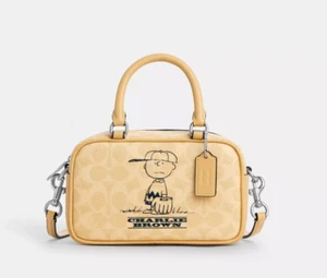 COACH x PEANUTS 2025 Satchel Crossbody Bag Signature Canvas Charlie Brown CBJ63 - Picture 1 of 6