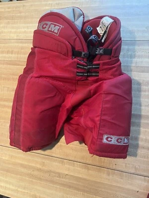 CCM Tacks - Pantalones de hockey medianos junior rojos muy buen estado Foto 1 de 4