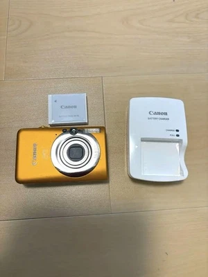 Cámara digital Canon IXY DIGITAL 110 PowerShot SD1200 IXUS 95 IS 10,0 MP naranja Foto 1 de 4