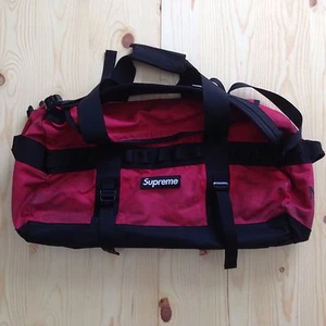 SUPREME x THE NORTH FACE WAXED  BRITISH MILLERAIN BASECAMP DUFFLE BAG TNF RED - Picture 1 of 12