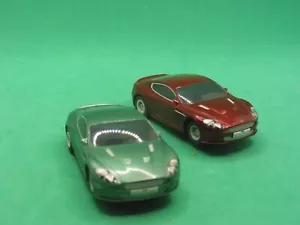 Scalextric MICRO 1/64TH SCALE PAIR OF SET ASTON MARTIN EXCELLENT UNBOXED - Picture 1 of 3