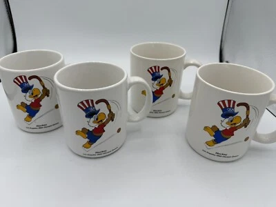 "4 tazas de café de hockey Sam the Olympic Eagle 1984 vintage de los Juegos Olímpicos de Los Ángeles 4""" Foto 1 de 4