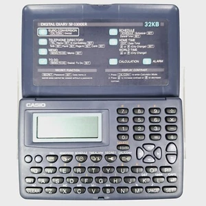 Vintage Casio Digital Diary Blue/Grey SF-3300ER 32KB Used Tested & Working - Afbeelding 1 van 11