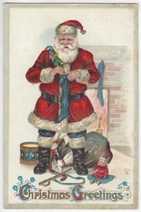 Medias de relleno de Navidad 1912 de Santa Claus con juguetes - postal vintage - Imagen 1 de 2