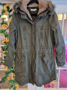 green parka with fur hood