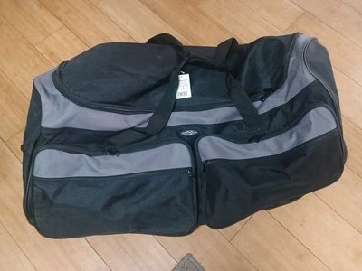 Travelers Club Space Saver 36-Inch Tri-fold 3-Wheel Rolling Locker, Black/Grey - Image 1 of 4