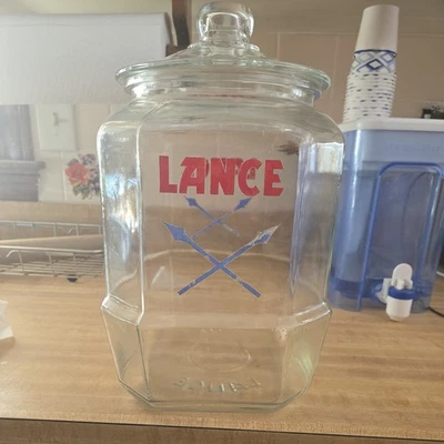 Tarro de cristal Lance años 30 con tapa de cristal, 12 pulgadas, 8 caras cruzado logotipo azul Foto 1 de 3