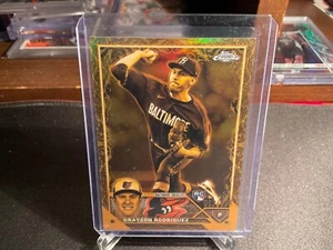 2024 Topps Gilded #268 Grayson Rodriguez /199 Cast In Gold - Picture 1 of 2