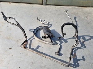 Jeep Cherokee XJ 97-01 facelift 4.0 engine air con pipes etc - Picture 1 of 2