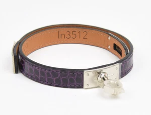 NEU IM KARTON AUTHENTISCH HERMES KELLY COUBLE TOUR MANSCHETTE ARMBAND CASSIS GLÄNZEND KROKODIL PHW - Bild 1 von 5