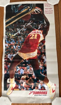 Dominique Wilkins 1985 NBA Slam Dunk Champion Brooks Shoes Poster - Image 1 of 4