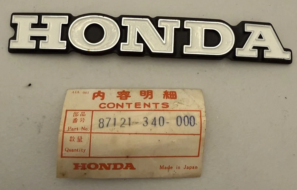 Новая из старых запасов эмблема бокового бензобака Honda SL350 K2 87121-340-000 - Изображение 1 из 1