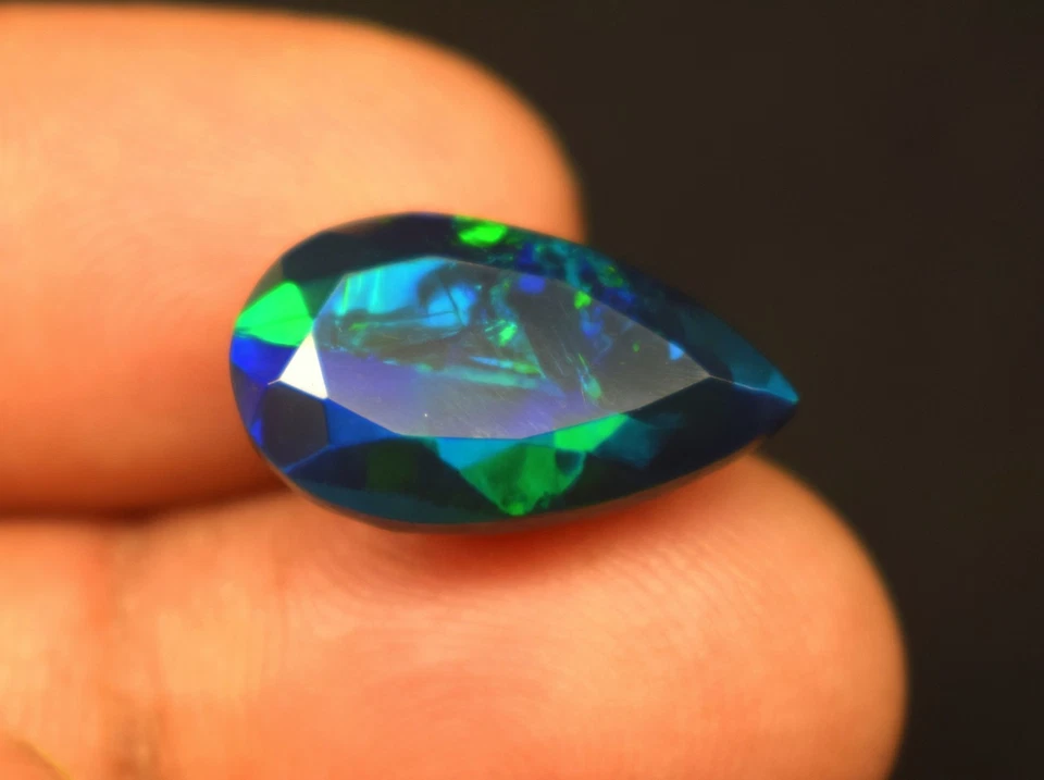 5.5 CT Fire Black Smoked Ethiopian Opal Pear Faceted Gemstone 17.5X10.3X7.7 mm - Image 1 of 4
