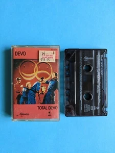 DEVO - Total Devo - (1988 Release) - Cassette Album - Post Punk / New Wave - Picture 1 of 2