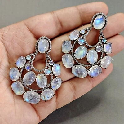 Aretes araña con piedras preciosas de luna arco iris blancas en plata de ley Foto 1 de 4