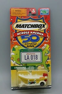 MATCHBOX ACROSS AMERICA LOUISIANA RAFT BOAT WITH TRAILER FROM 2001 NOC - Picture 1 of 3