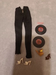 50er & 60er Barbie - schwarze Stretchhose mit seltsamem Zubehör Ende 50er gekauft - Bild 1 von 5