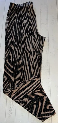 Chico’s Travelers black & beige tiger print flare leg pull-on pants Size 2 Large - Image 1 of 4
