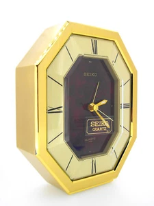 Seiko Quartz desk or table Alarm Clock, dark red face, hexagonal dial, QEJ196R - Picture 1 of 5