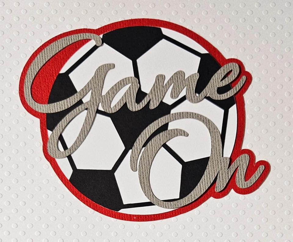 Juego de fútbol por título. Álbum de recortes, piezas de papel para hacer tarjetas Foto 1 de 1