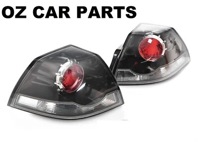 BLACK TAIL LIGHT LAMP VE SEDAN OMEGA SS SV6 SSV HOLDEN COMMODORE PAIR NEW - image 1 of 2