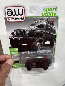 2021 Auto World 2017 Jeep Wrangler Sahara Unlimited Black #4 Limited Edition NEW - Picture 1 of 8
