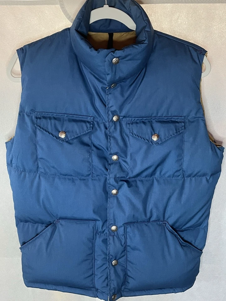 Etiqueta The North Face Vintage Años 80 Plumón de Ganso Azul Y Marrón Tostado Para Hombre Talla Pequeña Foto 1 de 4