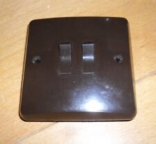 Vintage brown bakelite MK light switch. 2G2W. Rocker action. Unused.