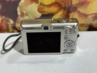 Cámara digital Canon PowerShot ELPH SD600 para piezas o reparación Foto 1 de 4