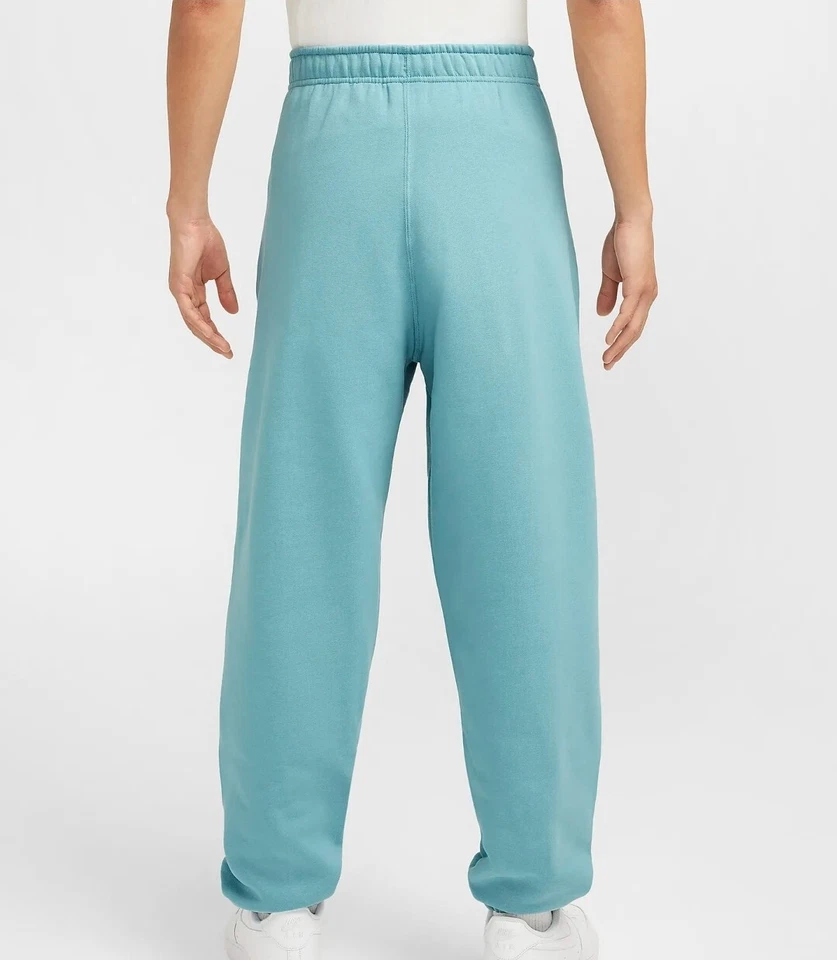 Pantalones de vellón Nike Solo Swoosh talla GRANDE agua turquesa blanco para hombre DX1364 440 Foto 1 de 4