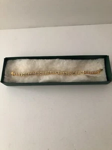 18kt gold over sterling silver .25ct genuine diamond tennis bracelt - Picture 1 of 7