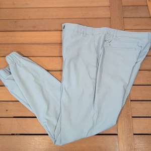 Pantalones de chándal de golf Puma para hombre talla 34 con puños cónicos al tobillo elásticos azules claros - Imagen 1 de 9