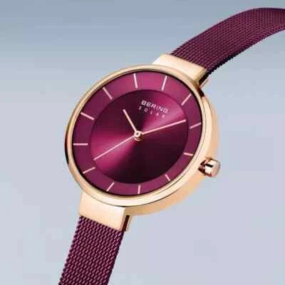 Reloj Bering Para Mujer Delgado Solar Rosa Púrpura Oro Rosa Banda Milanesa 14631-969 Foto 1 de 4