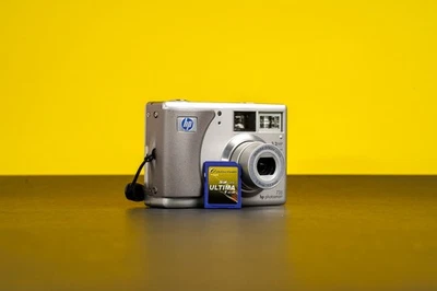 HP PhotoSmart 735  3.2MP Digital Camera Silver w/ Memory Card - Image 1 of 4