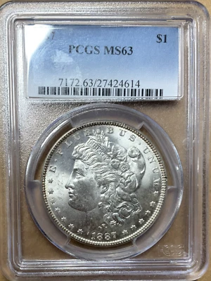Серебряный Моргановский доллар 1887 MS63 PCGS *0682 Тон по краям, морозный блеск и блеск - Изображение 1 из 4