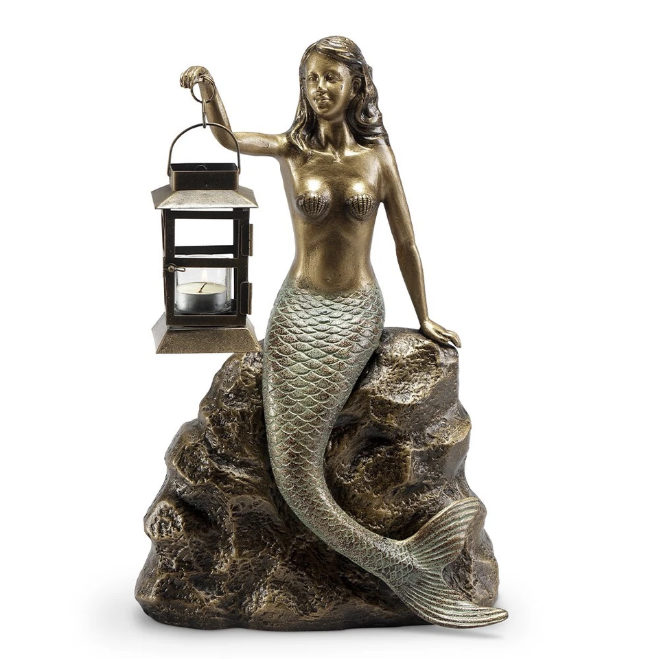 Hermosa sirena junto a la playa sentada en roca trae toque de vida oceánica linterna Foto 1 de 4